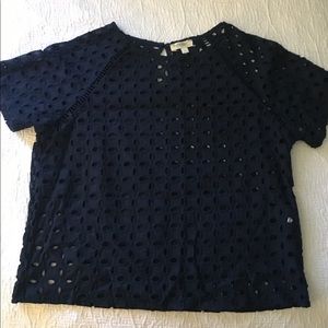 Blue shirt with holes